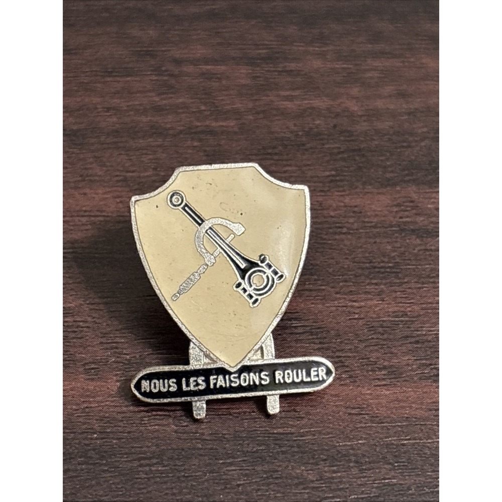 "Nous les faisons rouler" Shield Badge WWII N.S. Meyer Hallmark Army Corp USA